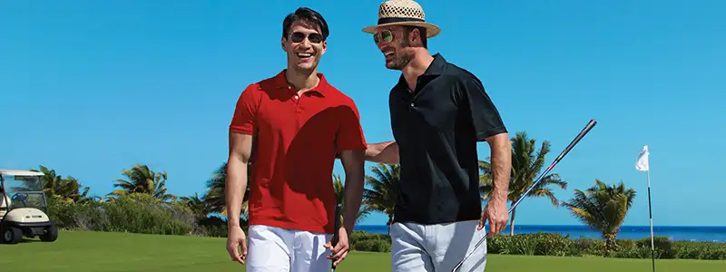 Two men golfing at a Breathless Resort