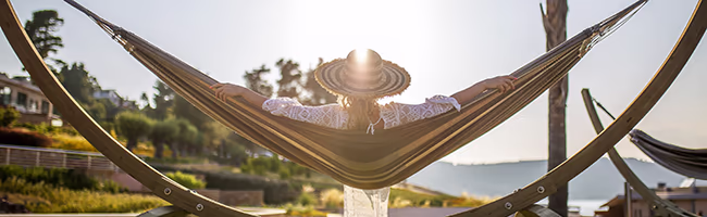 Woman relaxing in a hammock