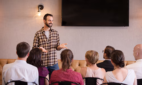 A mother points out nature from the deck of a cruise ship