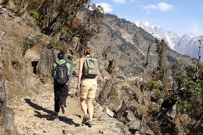 Two women trekking in India