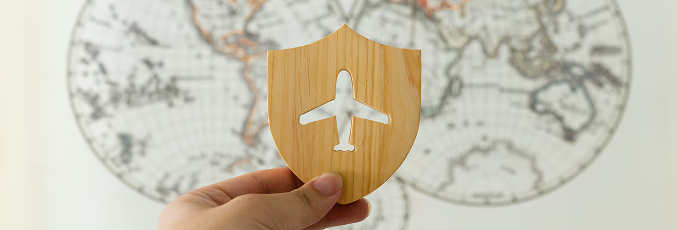 Shield in front of world map