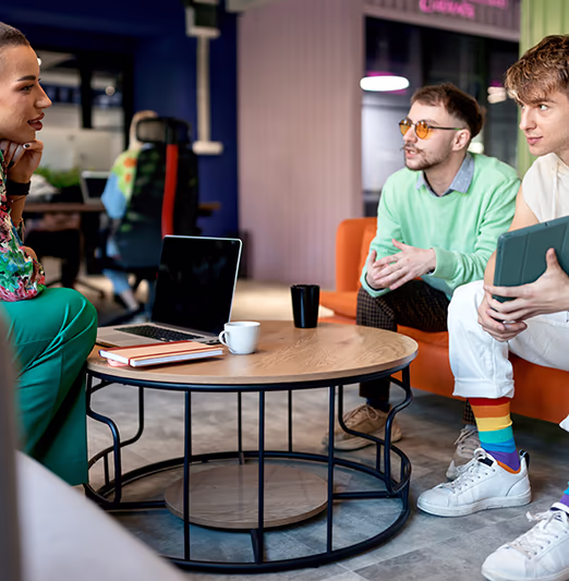 Three queer businesspeople meeting