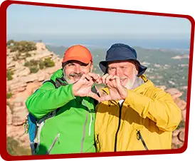 Gay couple makes heart-shaped hands